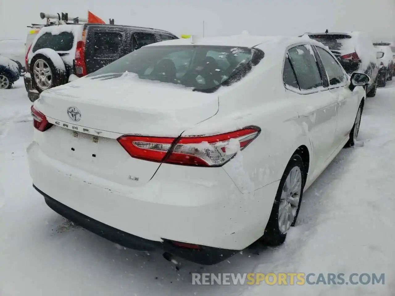 4 Photograph of a damaged car 4T1B11HK7KU784332 TOYOTA CAMRY 2019