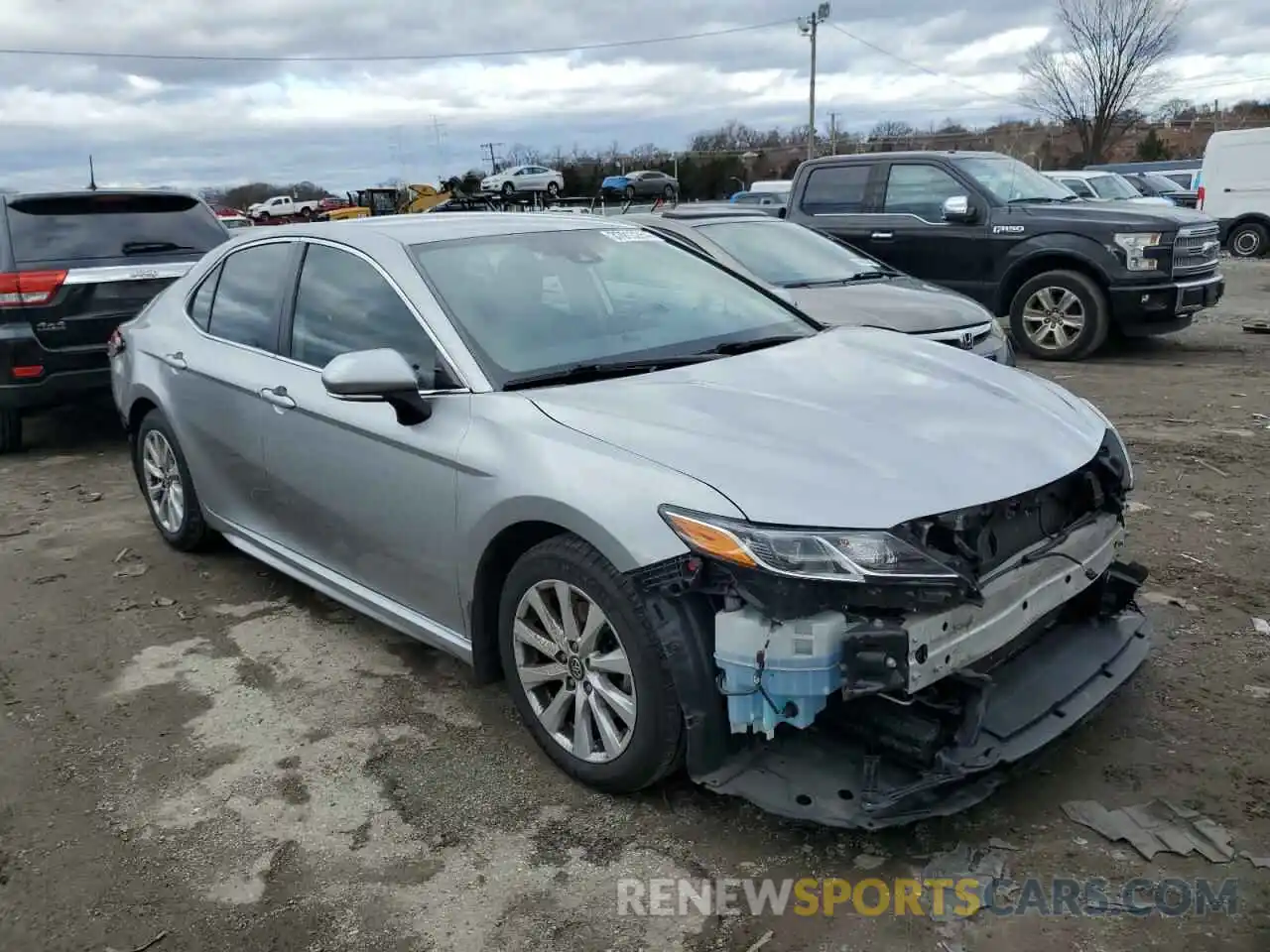 4 Photograph of a damaged car 4T1B11HK7KU786842 TOYOTA CAMRY 2019