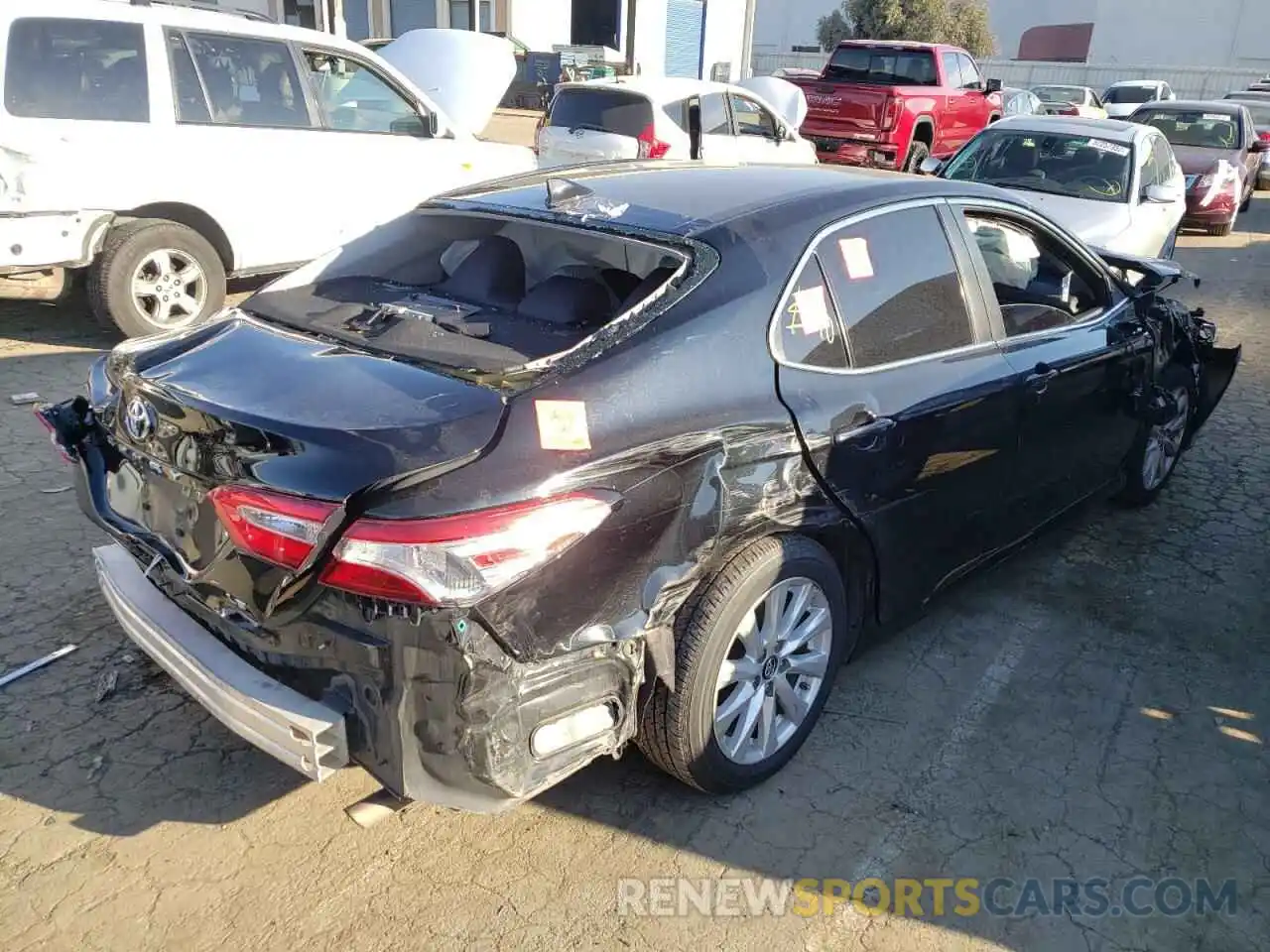 4 Photograph of a damaged car 4T1B11HK7KU787005 TOYOTA CAMRY 2019