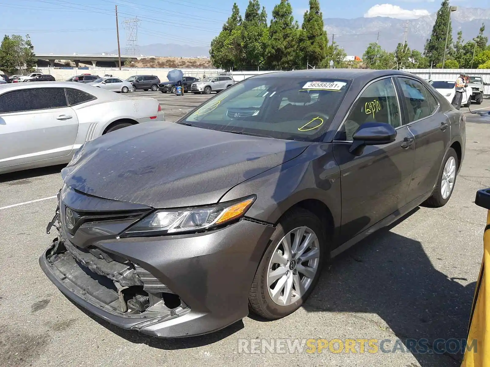 2 Photograph of a damaged car 4T1B11HK7KU787165 TOYOTA CAMRY 2019