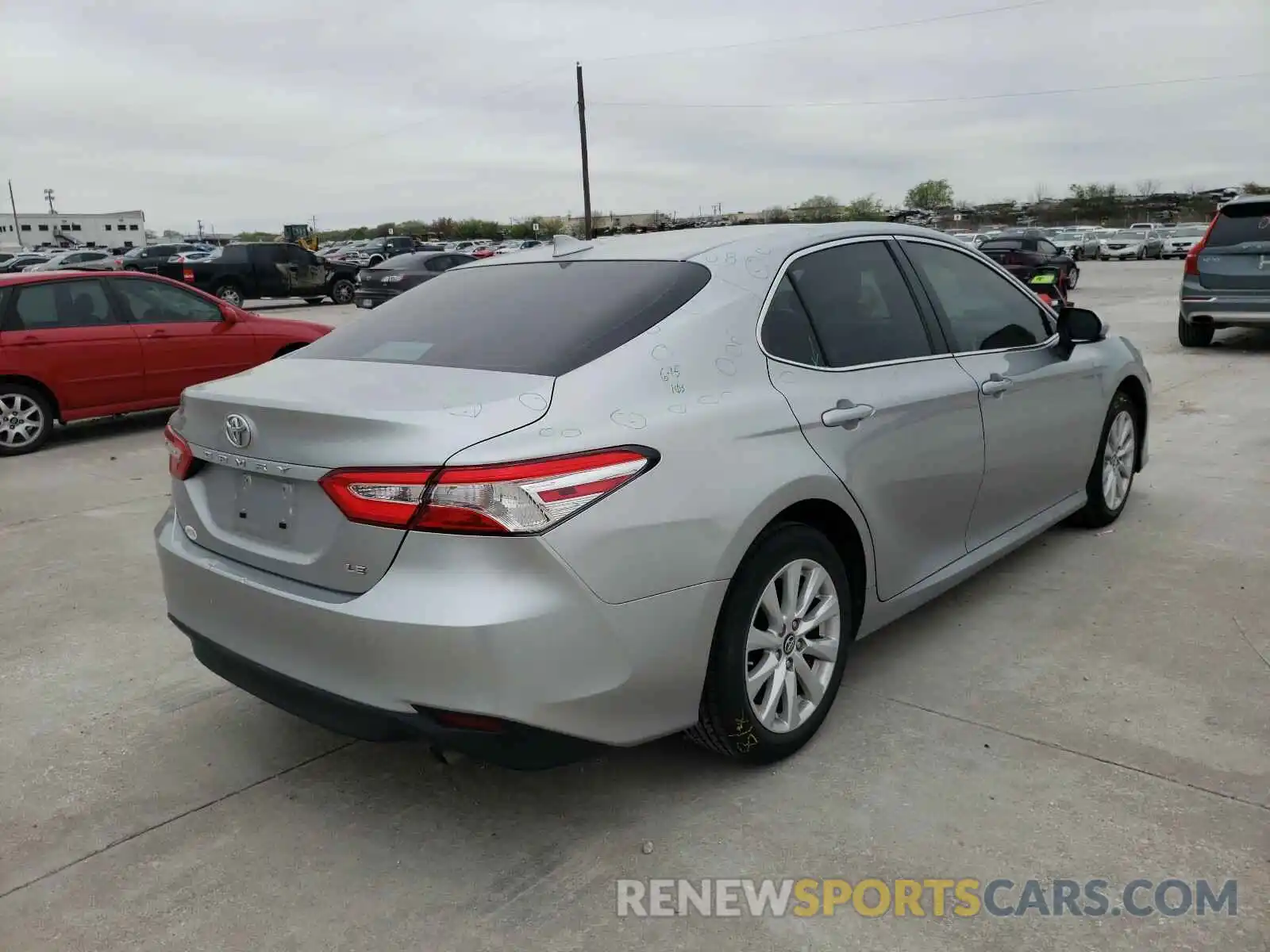 4 Photograph of a damaged car 4T1B11HK7KU788350 TOYOTA CAMRY 2019