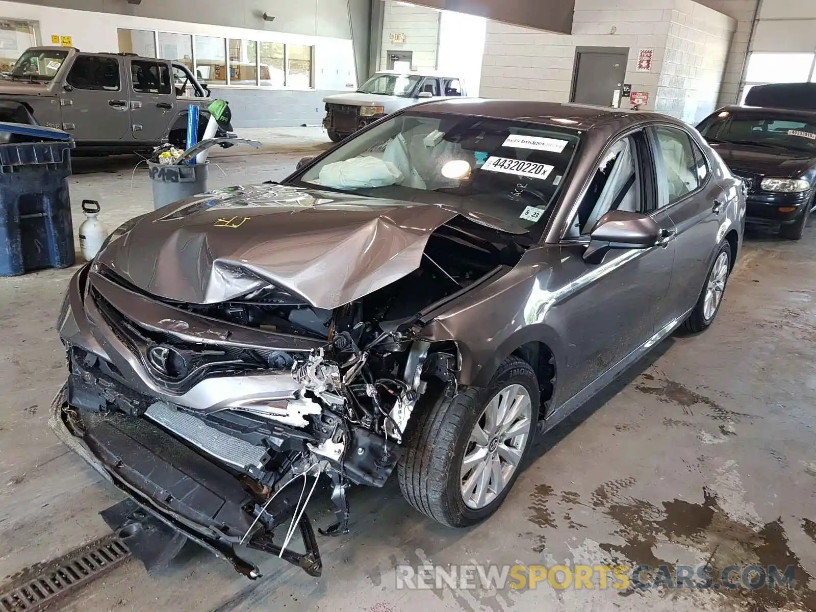 2 Photograph of a damaged car 4T1B11HK7KU789899 TOYOTA CAMRY 2019