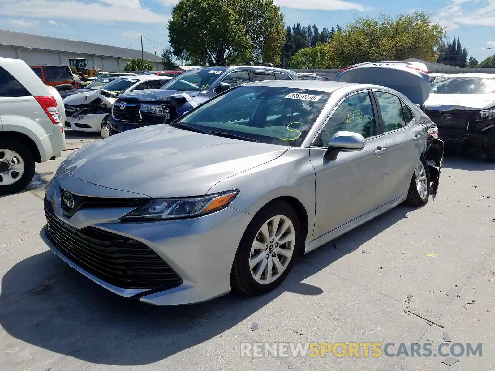 2 Photograph of a damaged car 4T1B11HK7KU793404 TOYOTA CAMRY 2019