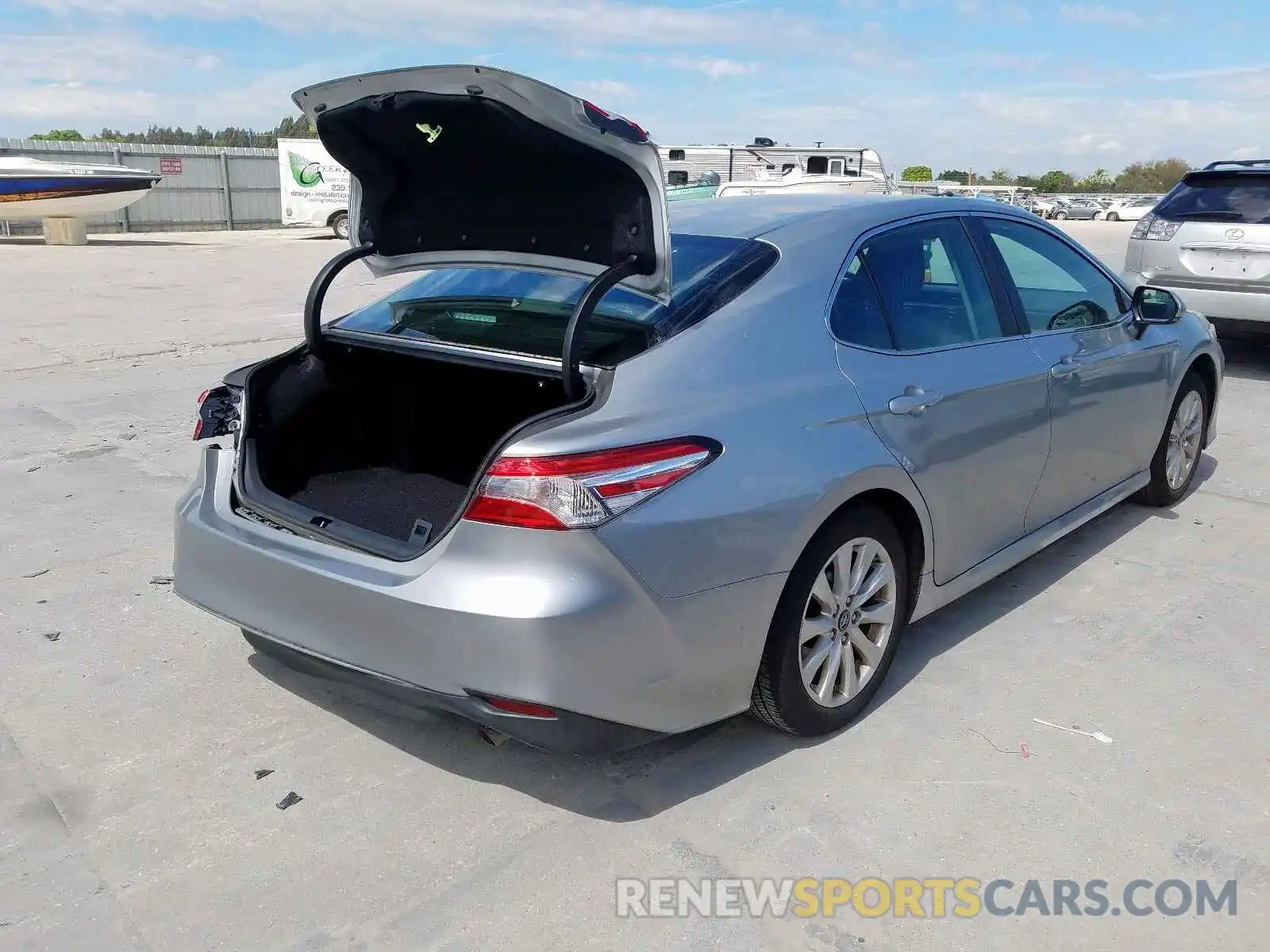 4 Photograph of a damaged car 4T1B11HK7KU793404 TOYOTA CAMRY 2019