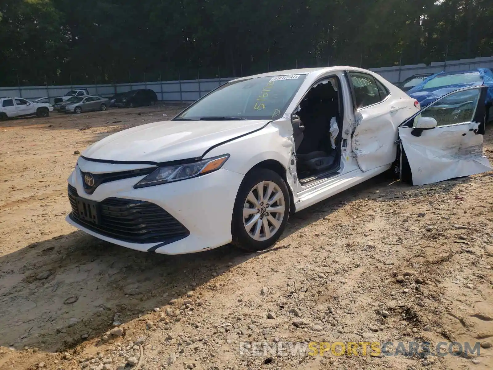 2 Photograph of a damaged car 4T1B11HK7KU794021 TOYOTA CAMRY 2019