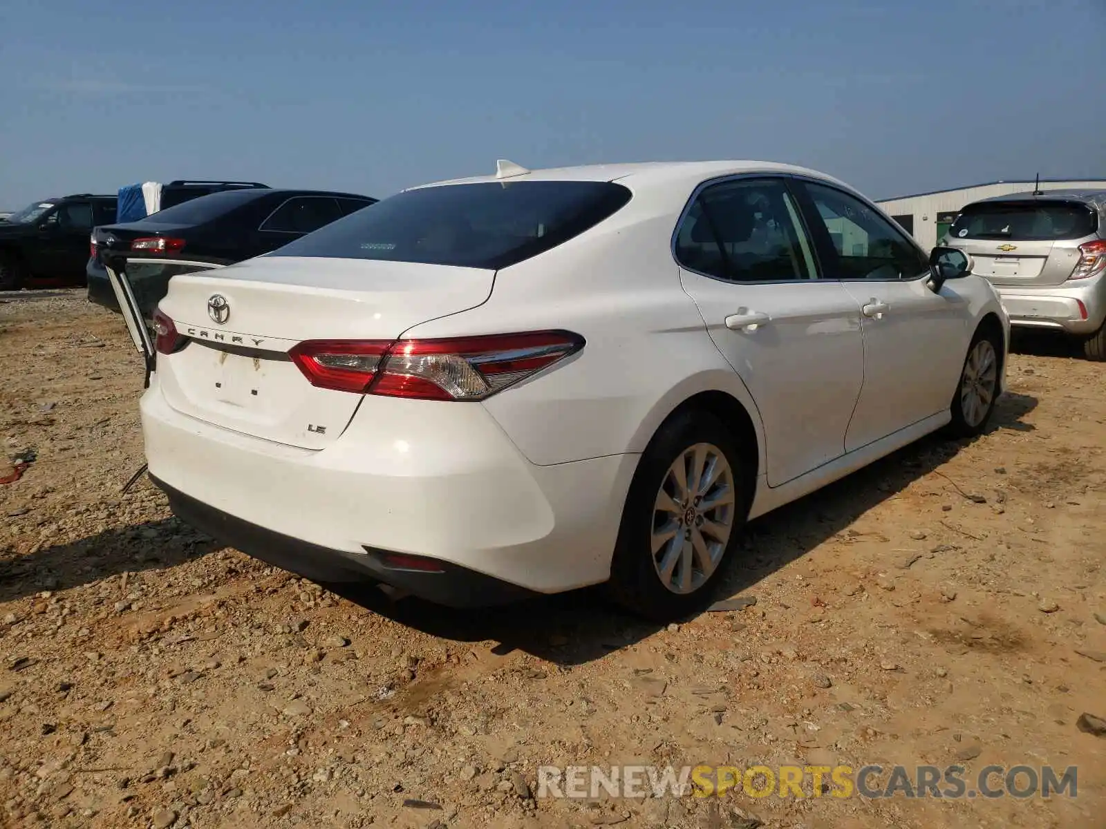 4 Photograph of a damaged car 4T1B11HK7KU794021 TOYOTA CAMRY 2019