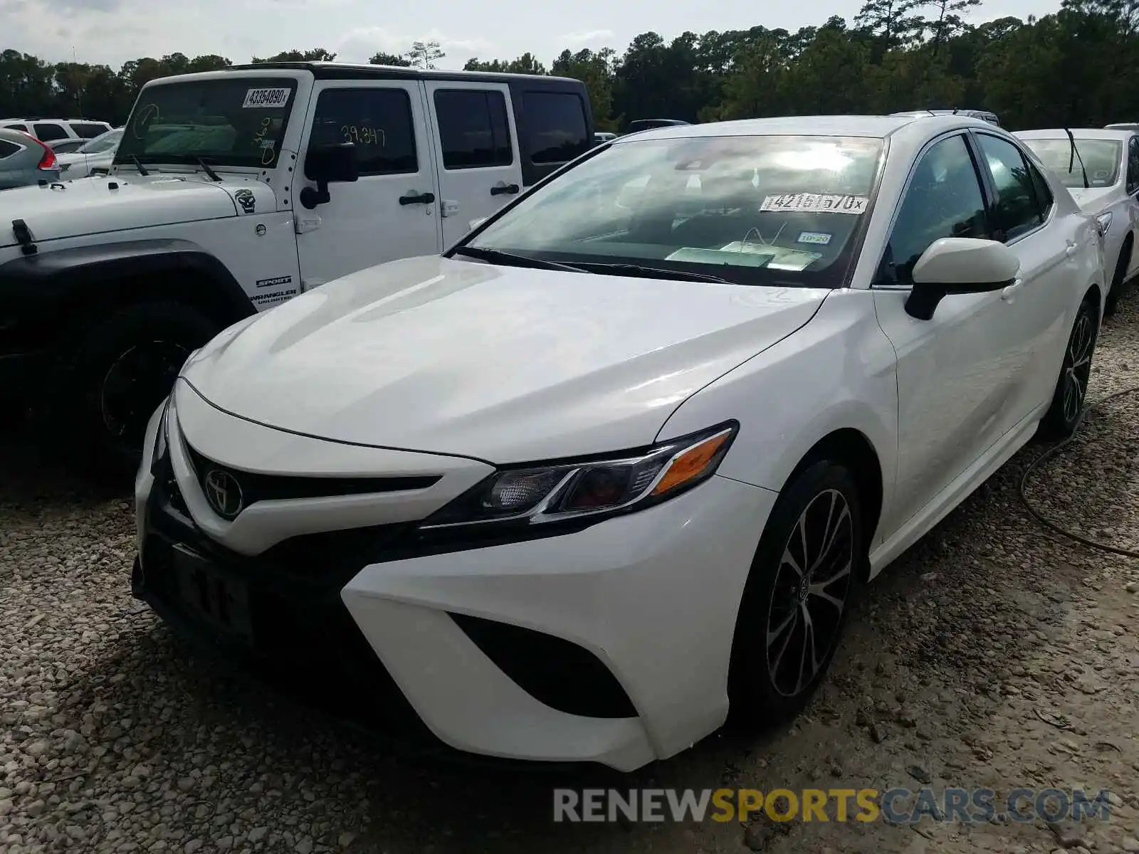 2 Photograph of a damaged car 4T1B11HK7KU796917 TOYOTA CAMRY 2019