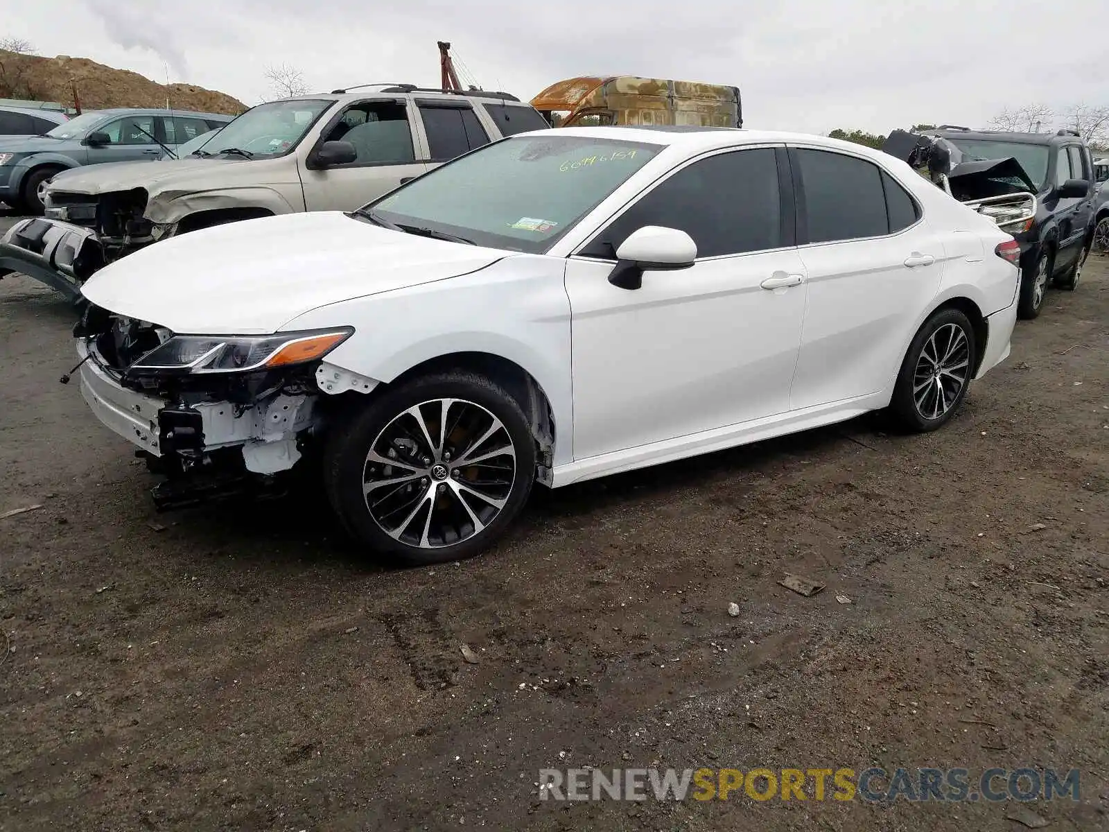 2 Photograph of a damaged car 4T1B11HK7KU798599 TOYOTA CAMRY 2019