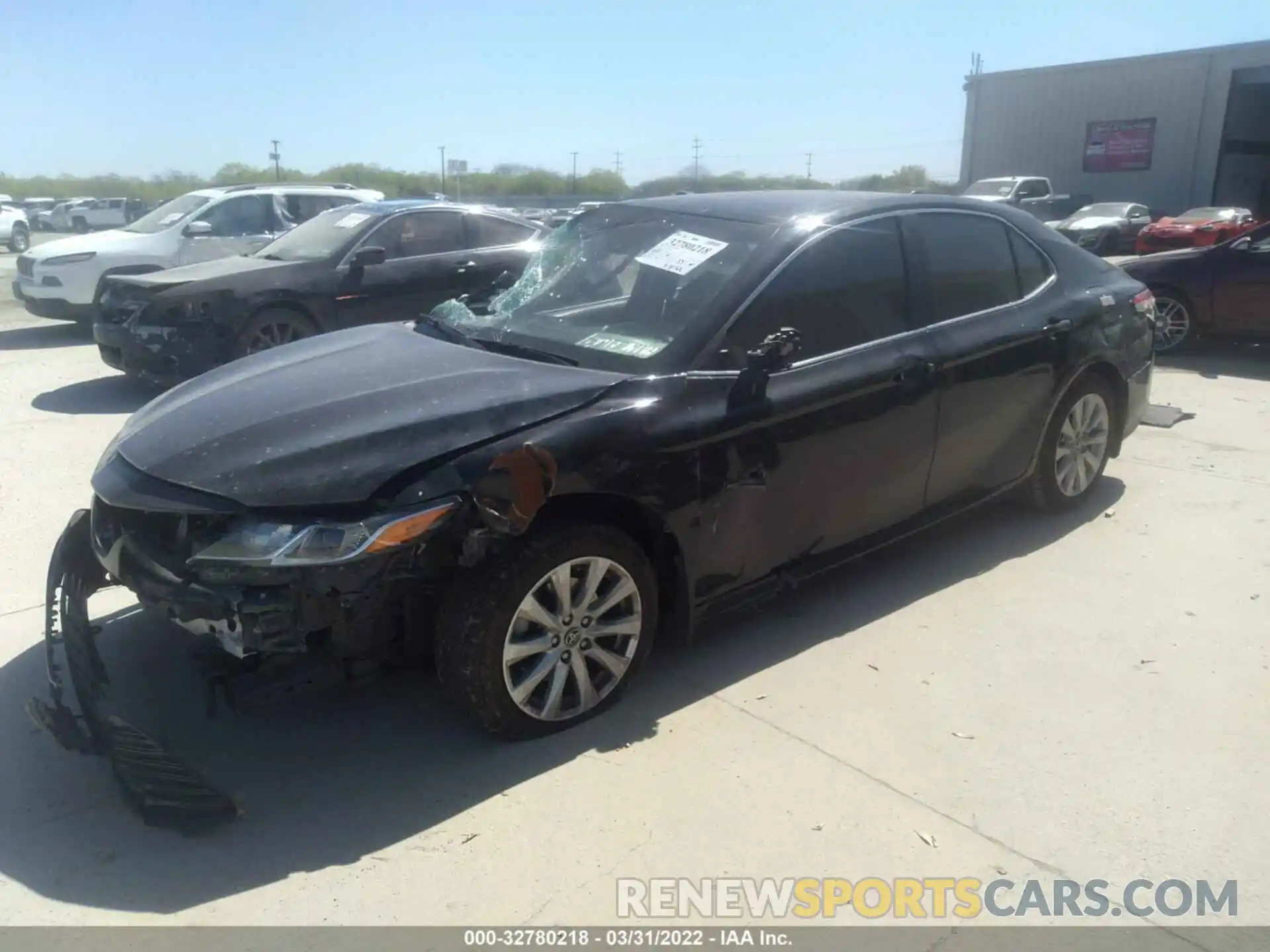 2 Photograph of a damaged car 4T1B11HK7KU799185 TOYOTA CAMRY 2019