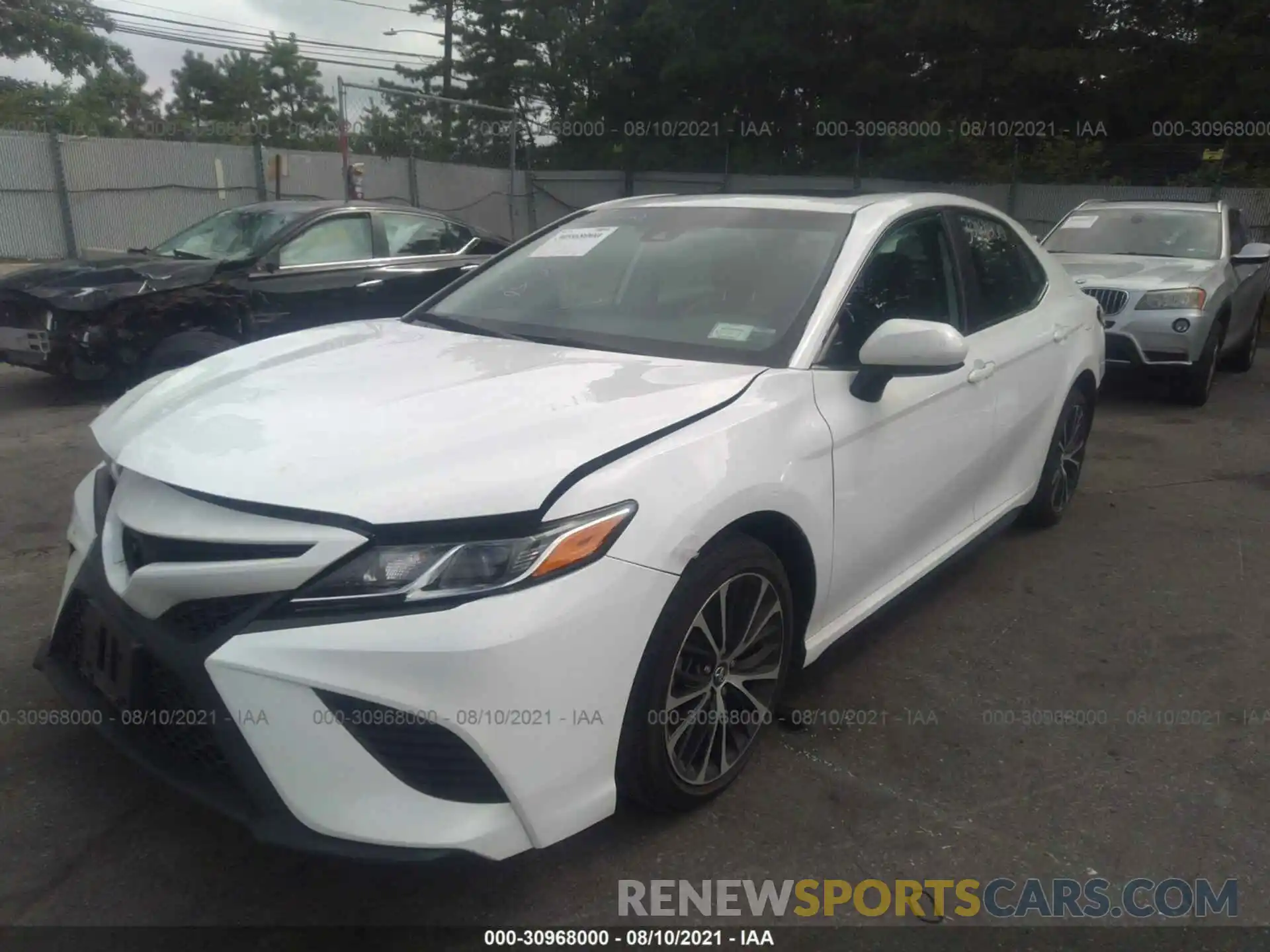 2 Photograph of a damaged car 4T1B11HK7KU801677 TOYOTA CAMRY 2019