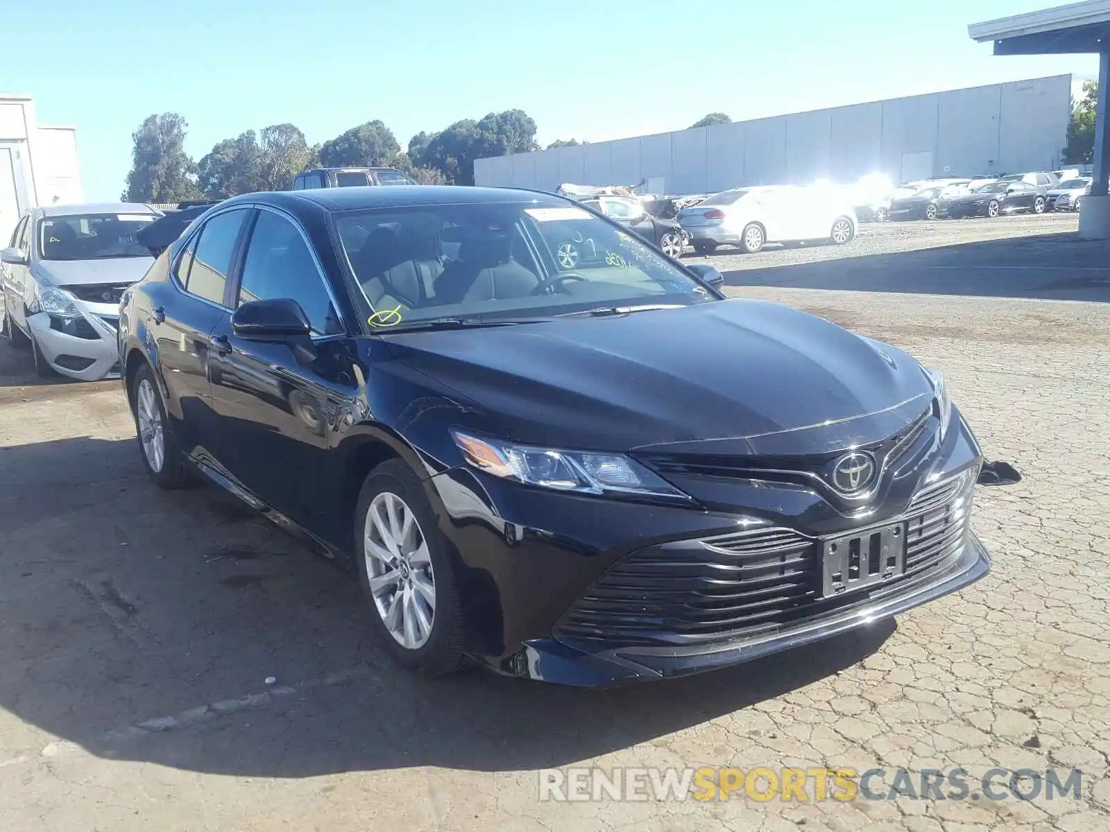 1 Photograph of a damaged car 4T1B11HK7KU801744 TOYOTA CAMRY 2019