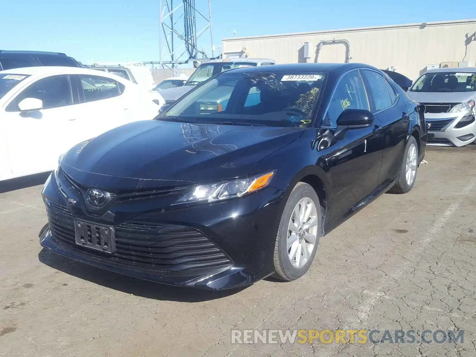 2 Photograph of a damaged car 4T1B11HK7KU801744 TOYOTA CAMRY 2019