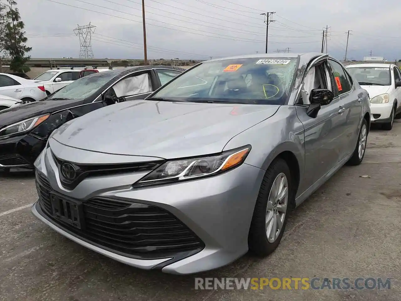 2 Photograph of a damaged car 4T1B11HK7KU801971 TOYOTA CAMRY 2019