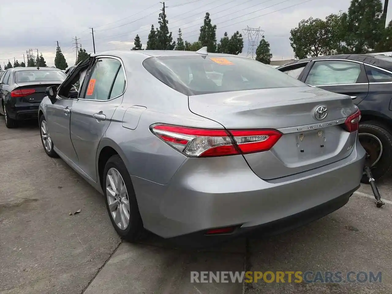 3 Photograph of a damaged car 4T1B11HK7KU801971 TOYOTA CAMRY 2019