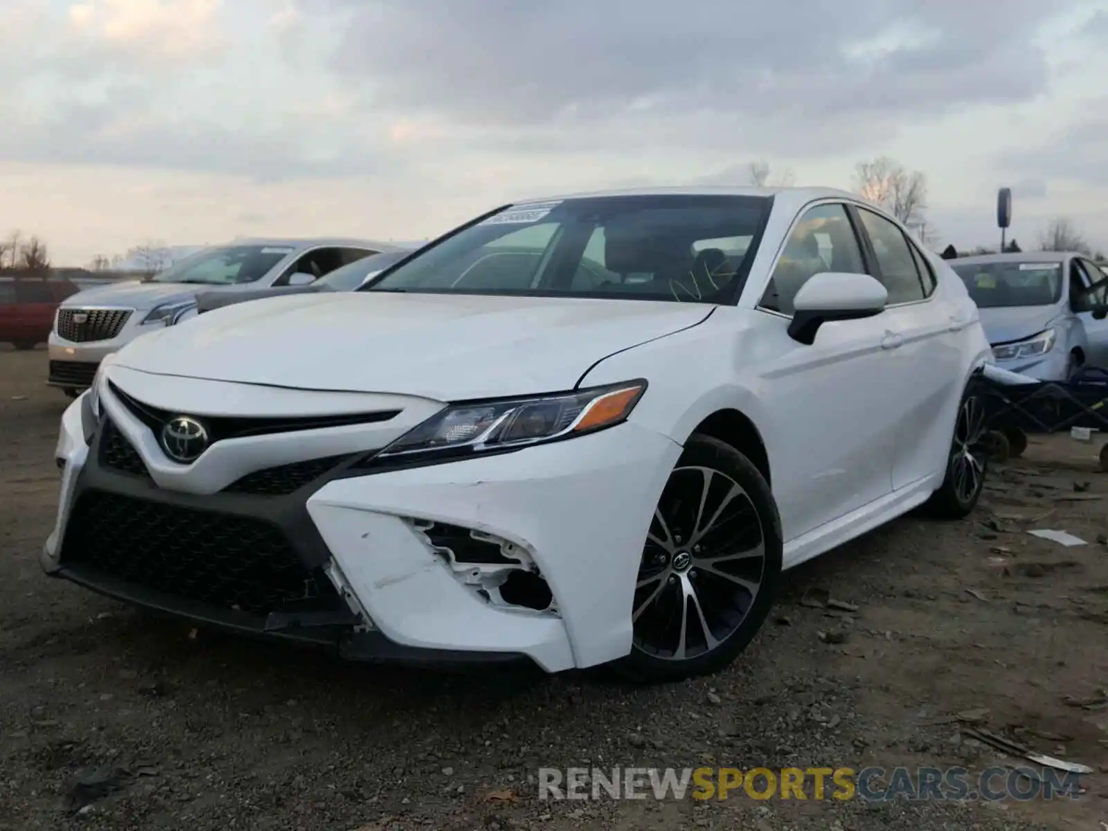 2 Photograph of a damaged car 4T1B11HK7KU801999 TOYOTA CAMRY 2019