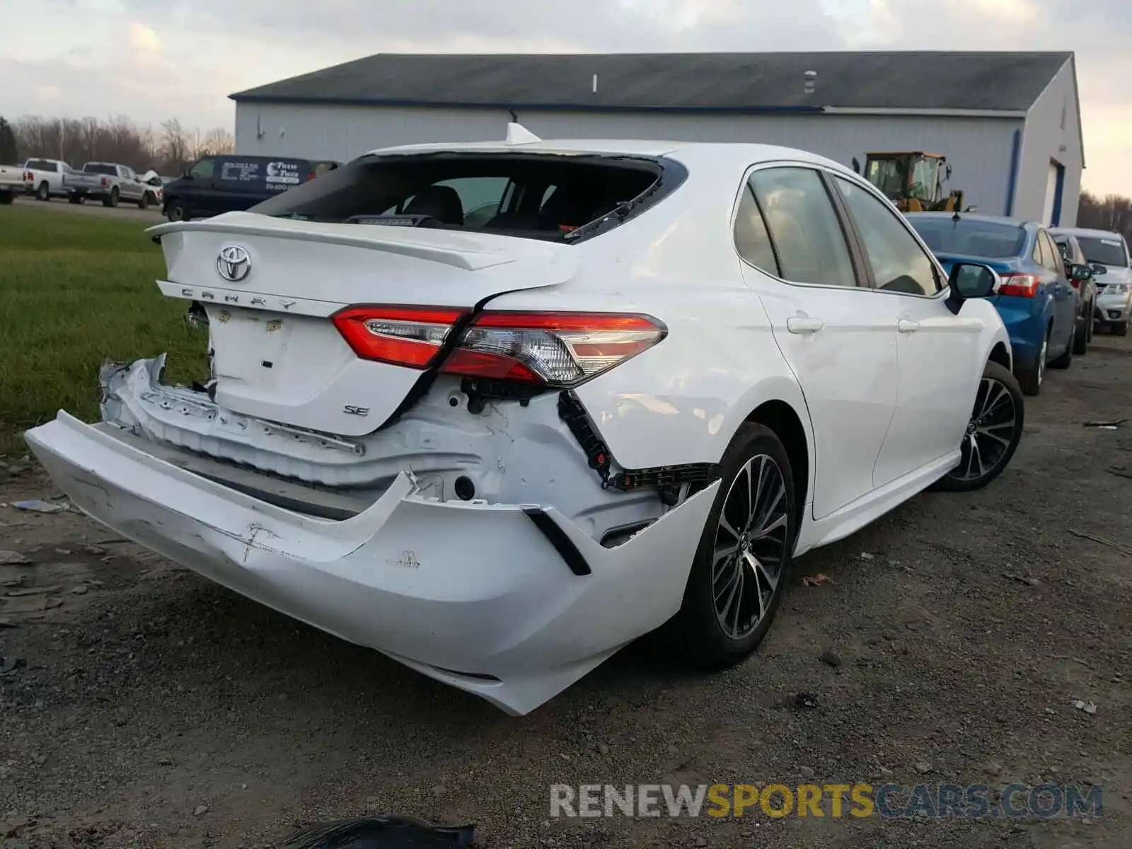 4 Photograph of a damaged car 4T1B11HK7KU801999 TOYOTA CAMRY 2019