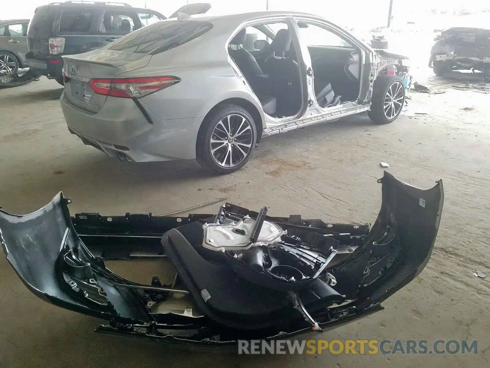 9 Photograph of a damaged car 4T1B11HK7KU803056 TOYOTA CAMRY 2019
