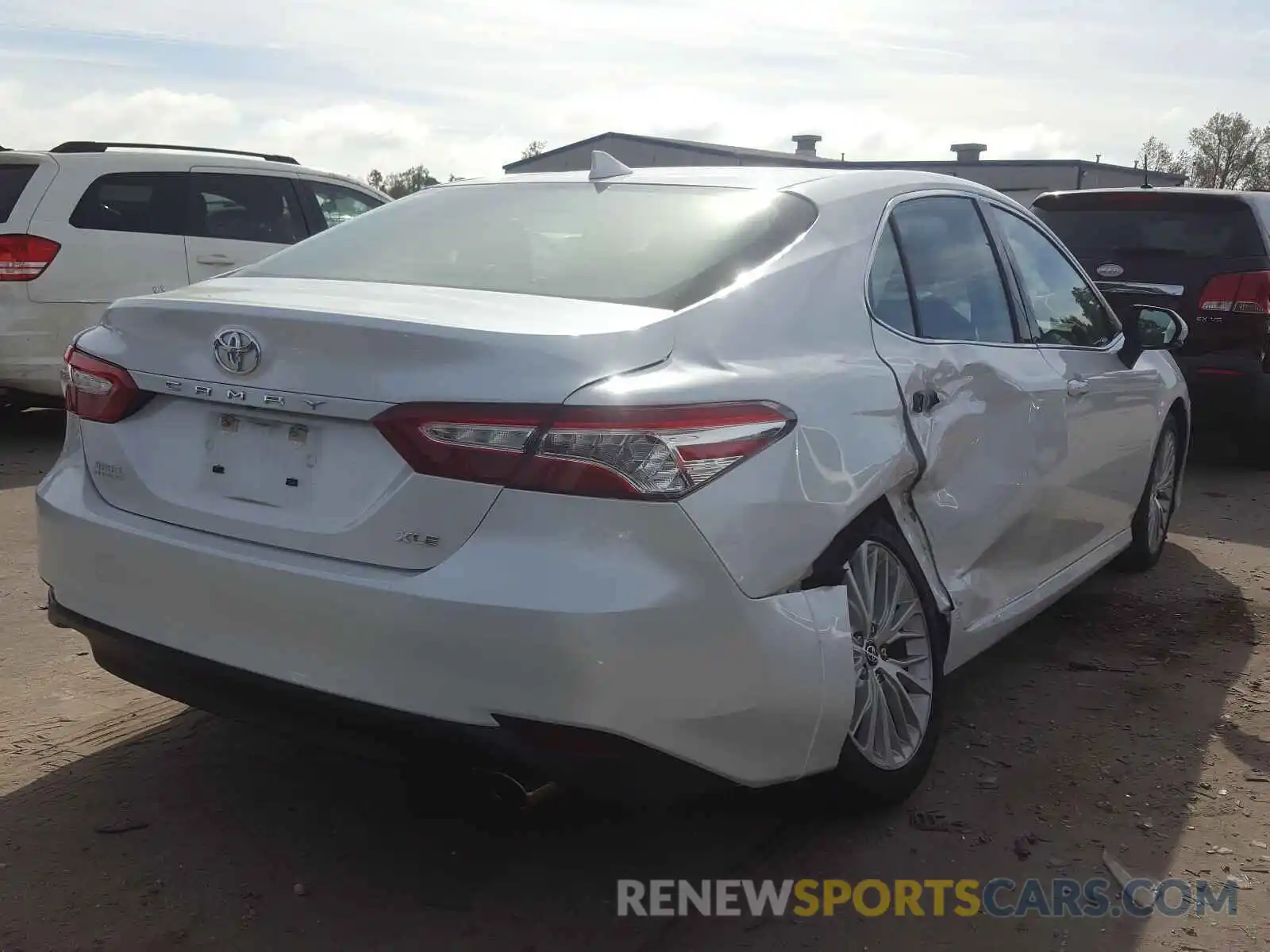 4 Photograph of a damaged car 4T1B11HK7KU806264 TOYOTA CAMRY 2019