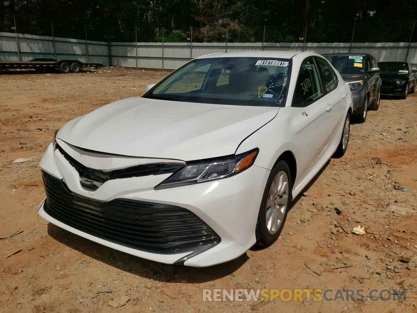 2 Photograph of a damaged car 4T1B11HK7KU806815 TOYOTA CAMRY 2019