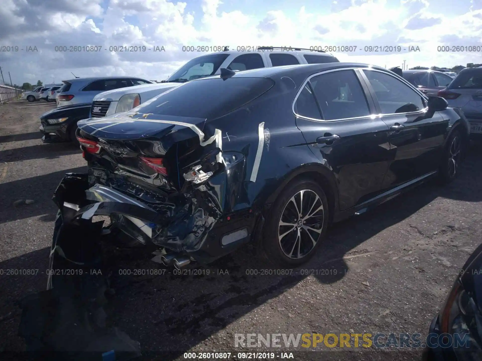 4 Photograph of a damaged car 4T1B11HK7KU807298 TOYOTA CAMRY 2019