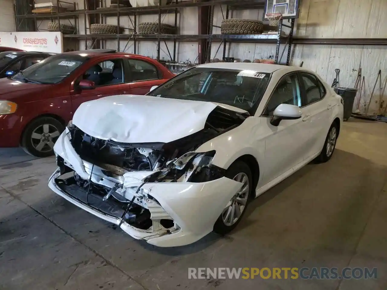 2 Photograph of a damaged car 4T1B11HK7KU808306 TOYOTA CAMRY 2019