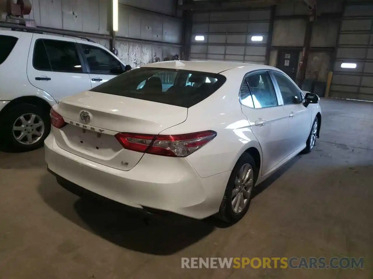 4 Photograph of a damaged car 4T1B11HK7KU808306 TOYOTA CAMRY 2019