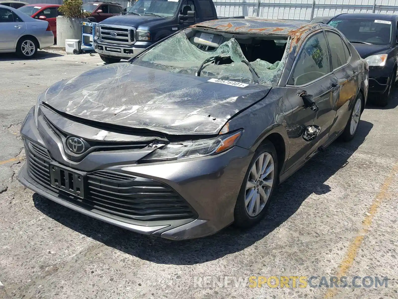 2 Photograph of a damaged car 4T1B11HK7KU809410 TOYOTA CAMRY 2019