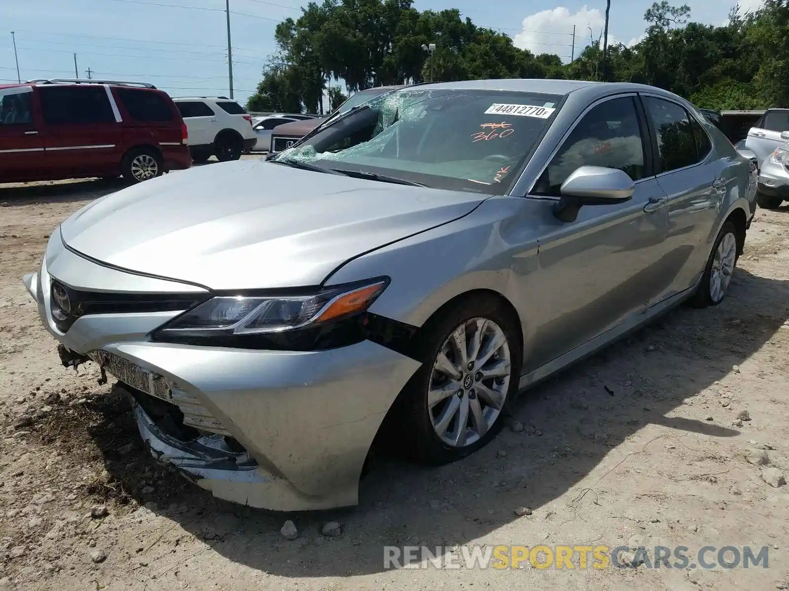 2 Photograph of a damaged car 4T1B11HK7KU809813 TOYOTA CAMRY 2019