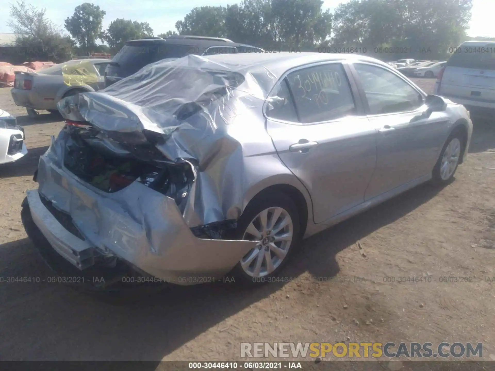 4 Photograph of a damaged car 4T1B11HK7KU810136 TOYOTA CAMRY 2019