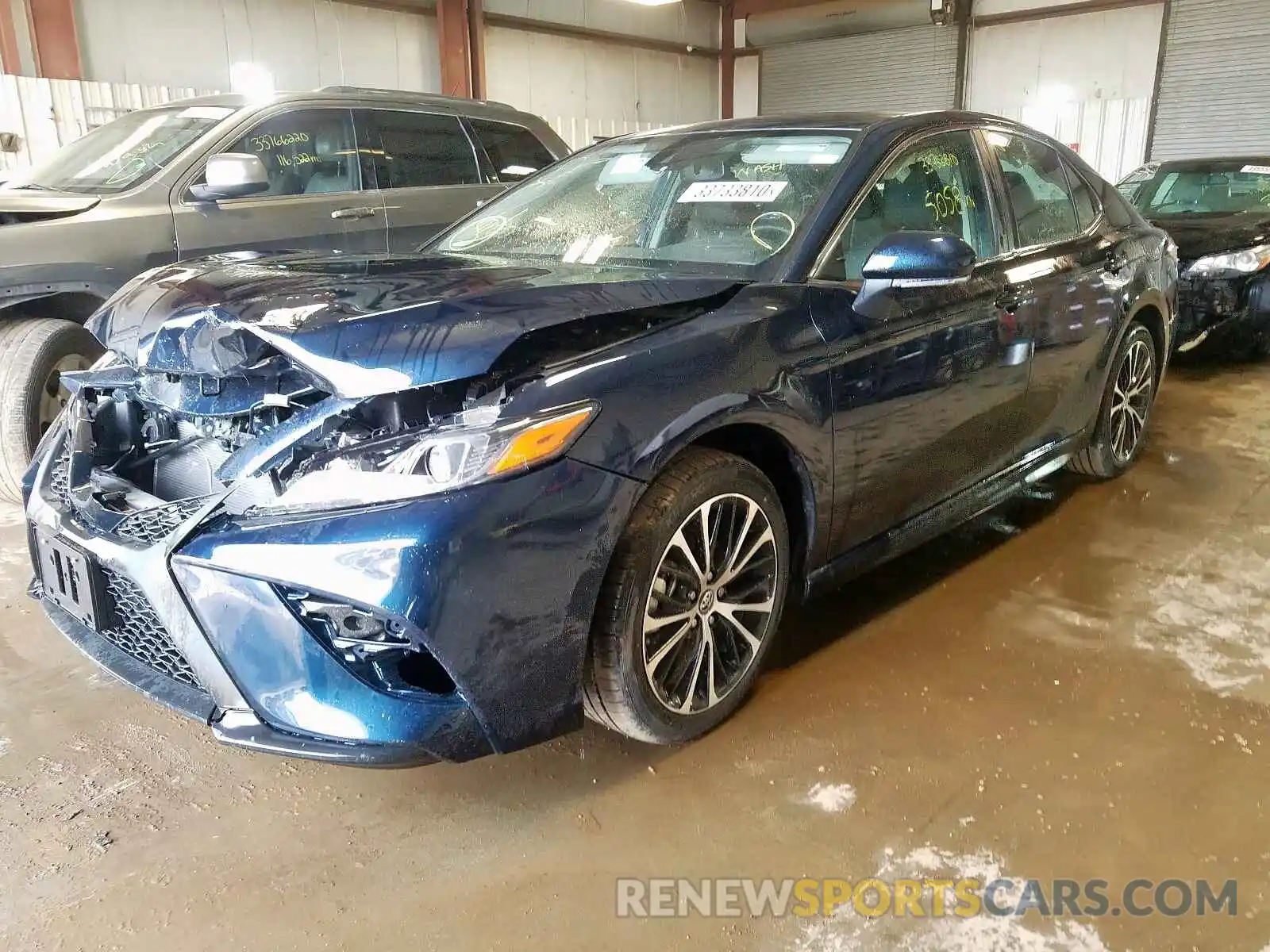 2 Photograph of a damaged car 4T1B11HK7KU810993 TOYOTA CAMRY 2019