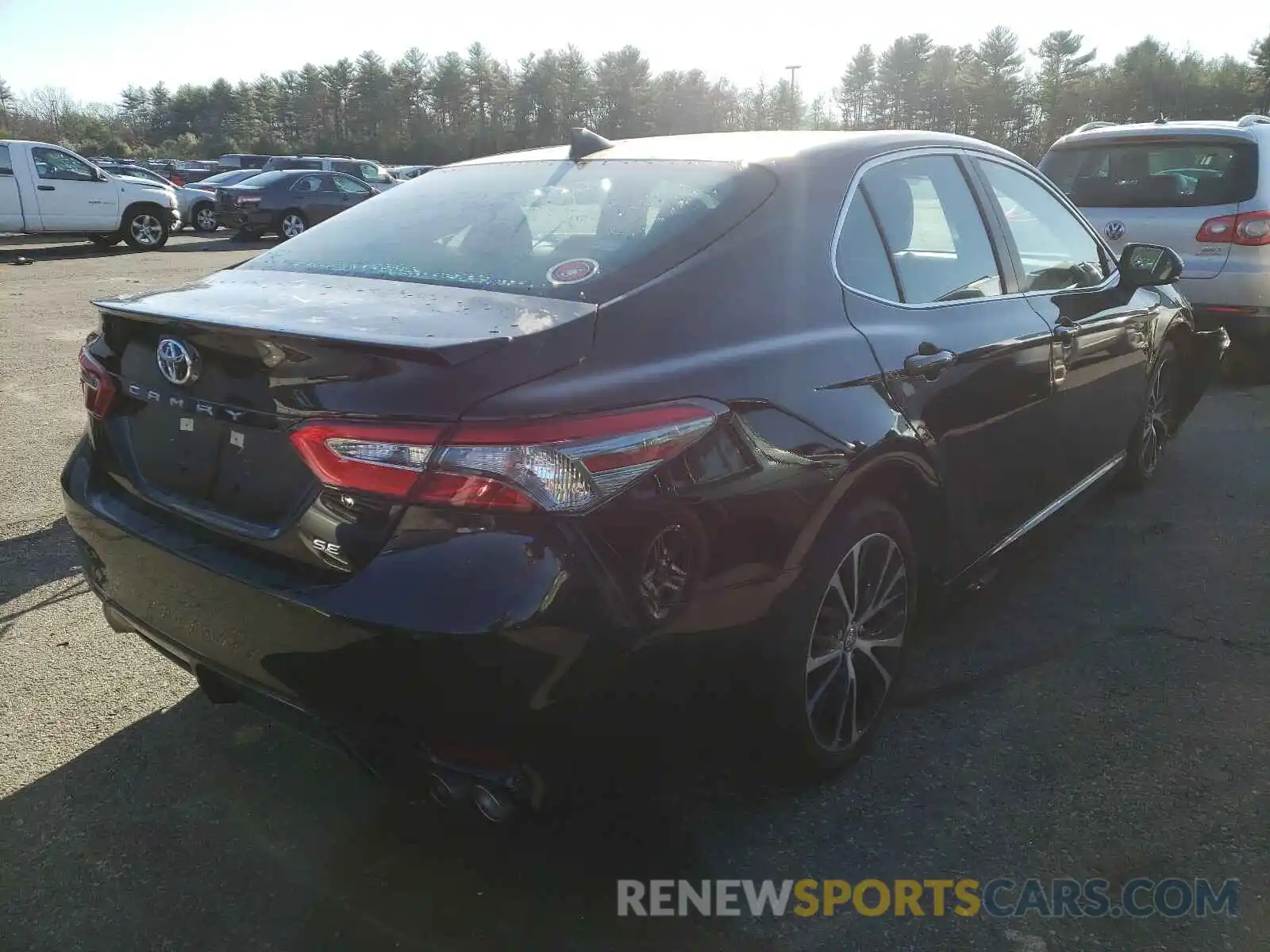 4 Photograph of a damaged car 4T1B11HK7KU811237 TOYOTA CAMRY 2019