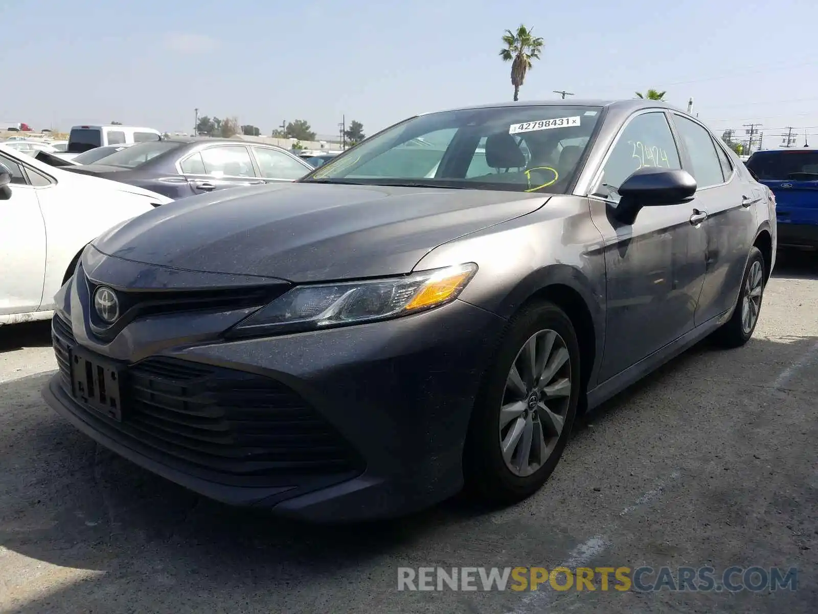 2 Photograph of a damaged car 4T1B11HK7KU811724 TOYOTA CAMRY 2019