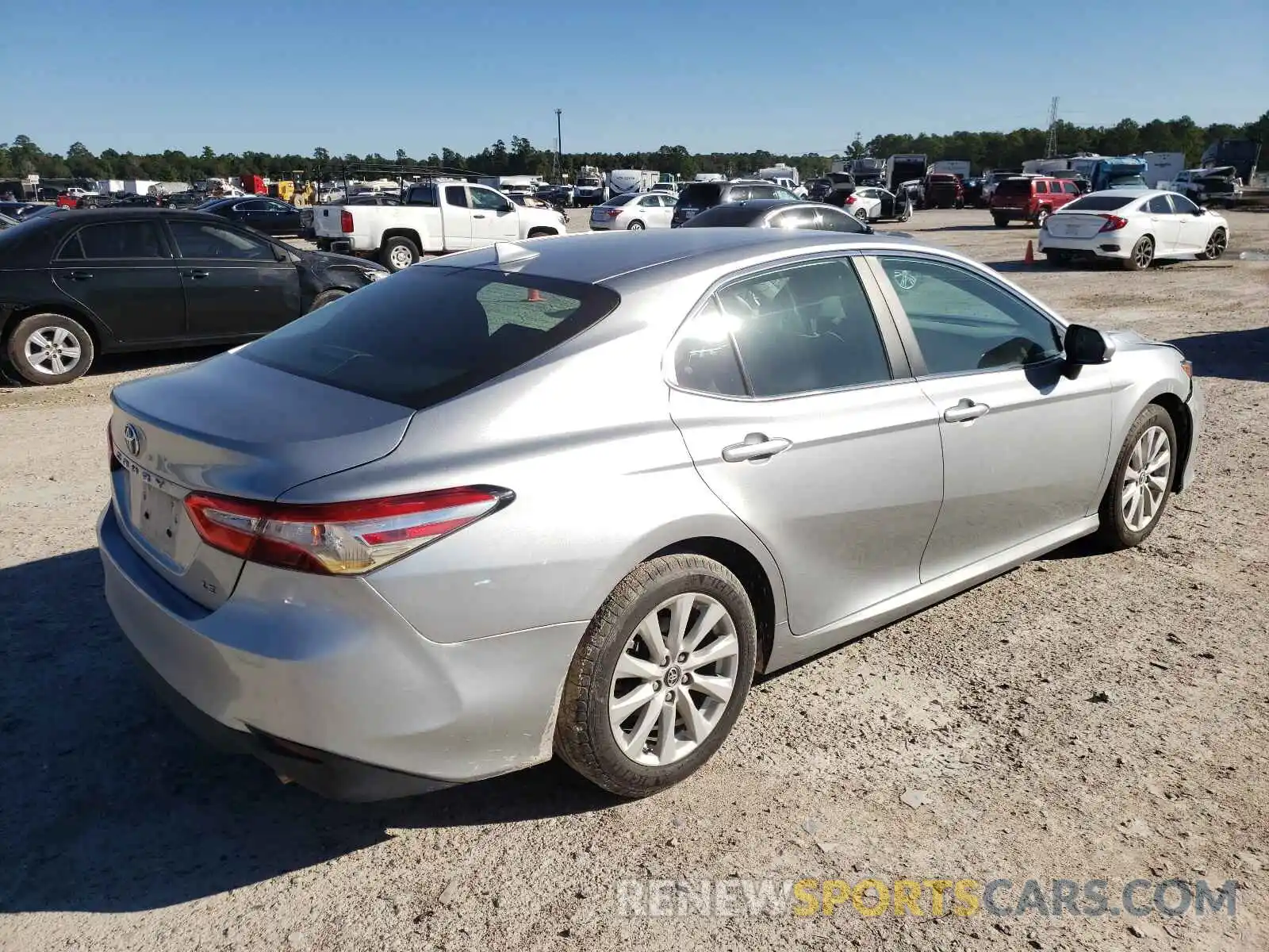 4 Photograph of a damaged car 4T1B11HK7KU814218 TOYOTA CAMRY 2019