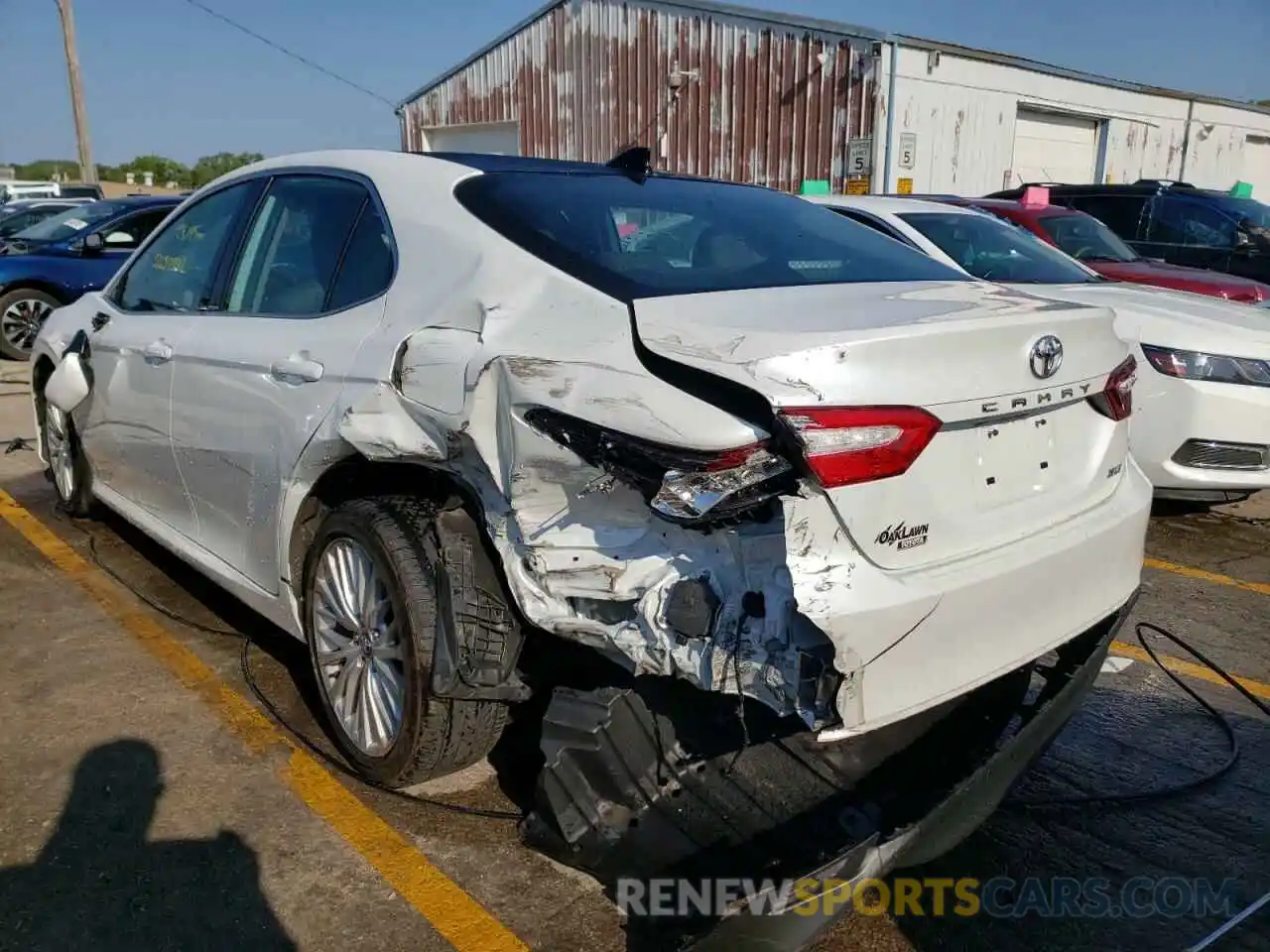 3 Photograph of a damaged car 4T1B11HK7KU814574 TOYOTA CAMRY 2019