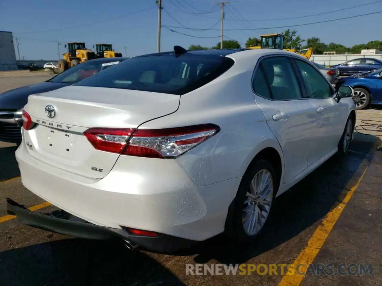 4 Photograph of a damaged car 4T1B11HK7KU814574 TOYOTA CAMRY 2019