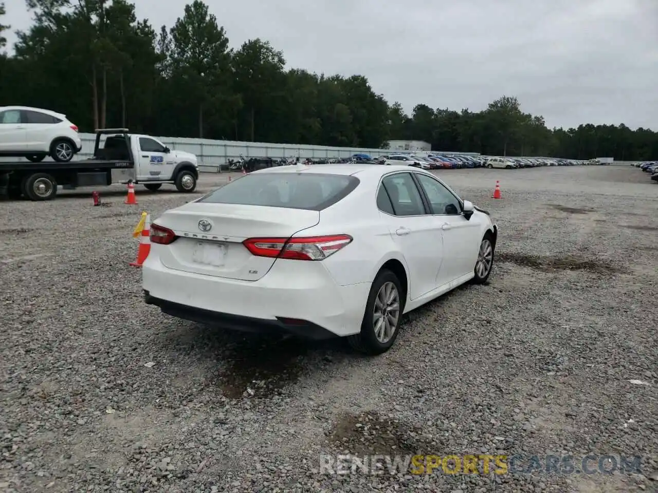 4 Photograph of a damaged car 4T1B11HK7KU816423 TOYOTA CAMRY 2019