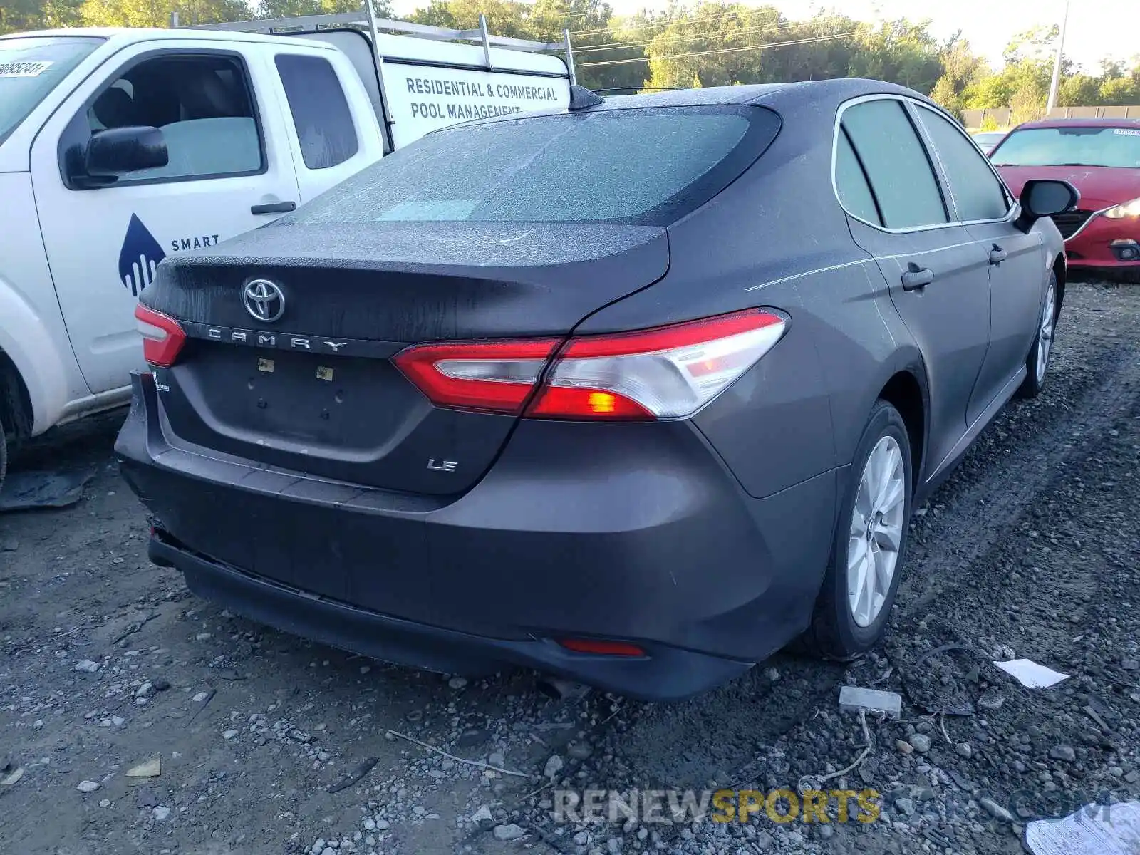 4 Photograph of a damaged car 4T1B11HK7KU817264 TOYOTA CAMRY 2019