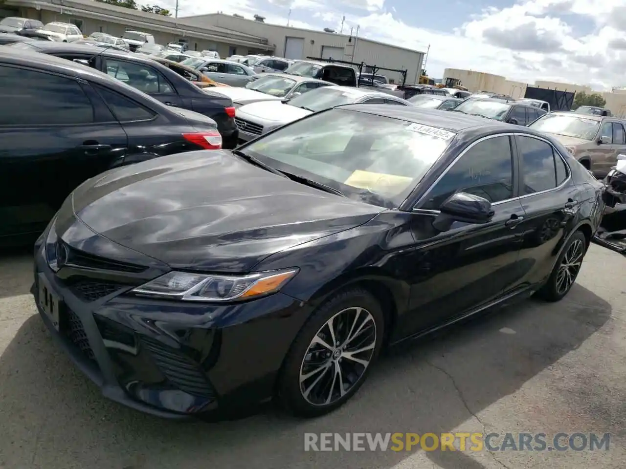 2 Photograph of a damaged car 4T1B11HK7KU818365 TOYOTA CAMRY 2019