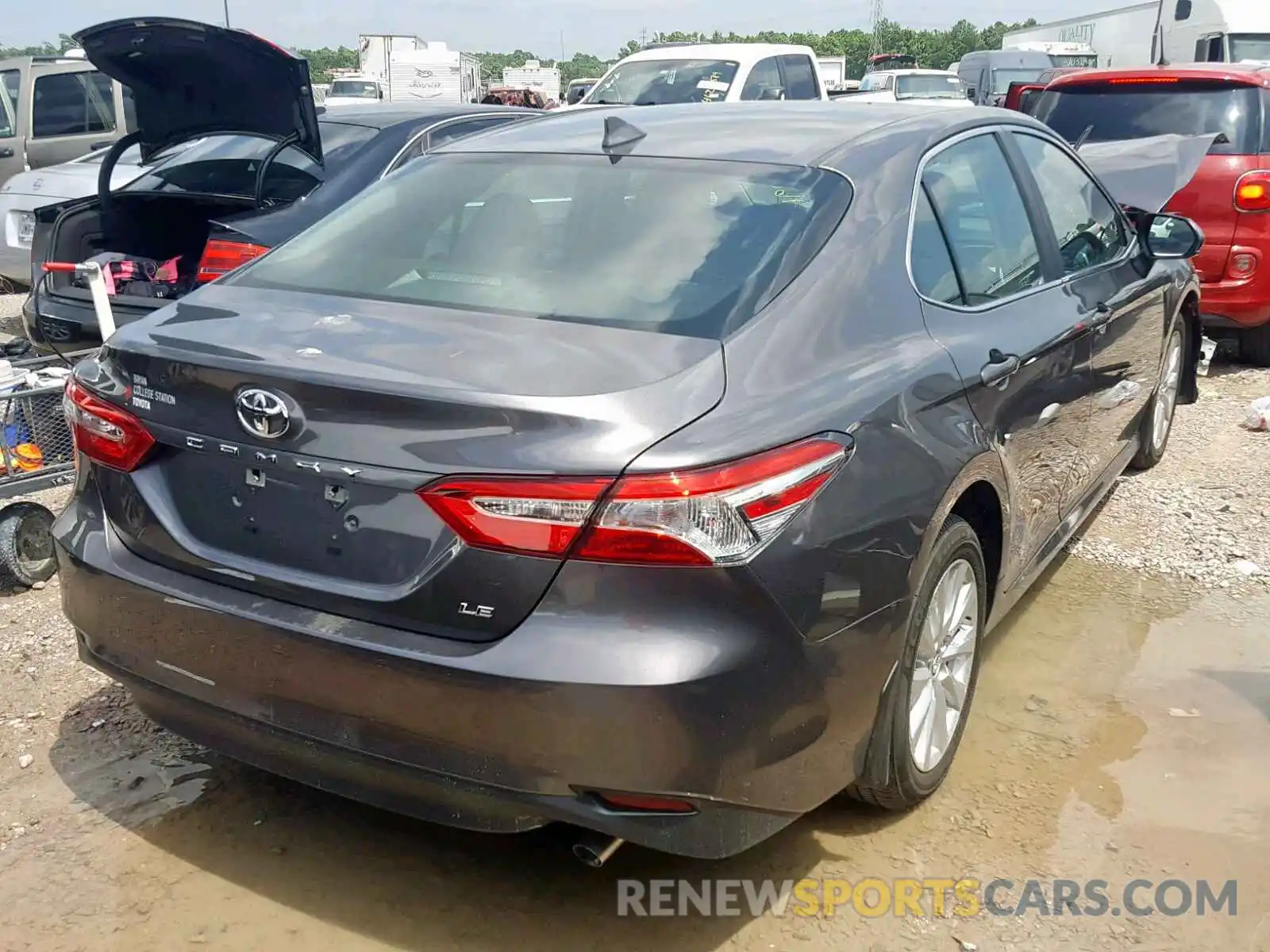 4 Photograph of a damaged car 4T1B11HK7KU818575 TOYOTA CAMRY 2019