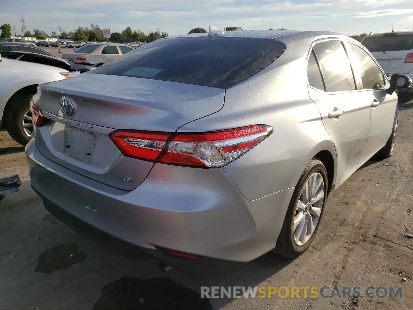 4 Photograph of a damaged car 4T1B11HK7KU820052 TOYOTA CAMRY 2019