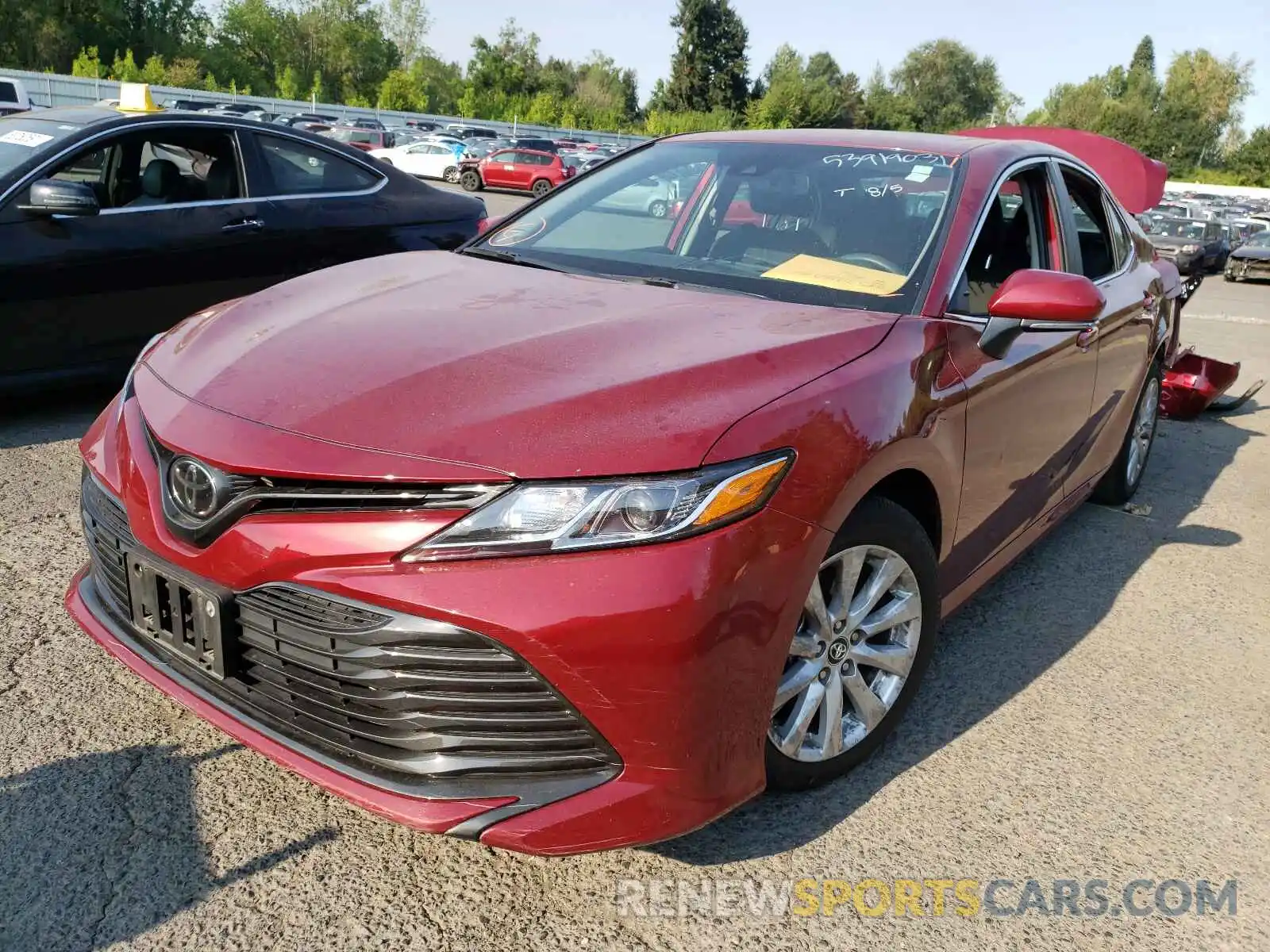 2 Photograph of a damaged car 4T1B11HK7KU824408 TOYOTA CAMRY 2019