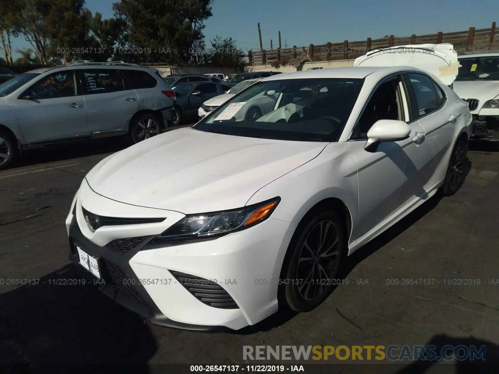 2 Photograph of a damaged car 4T1B11HK7KU824702 TOYOTA CAMRY 2019