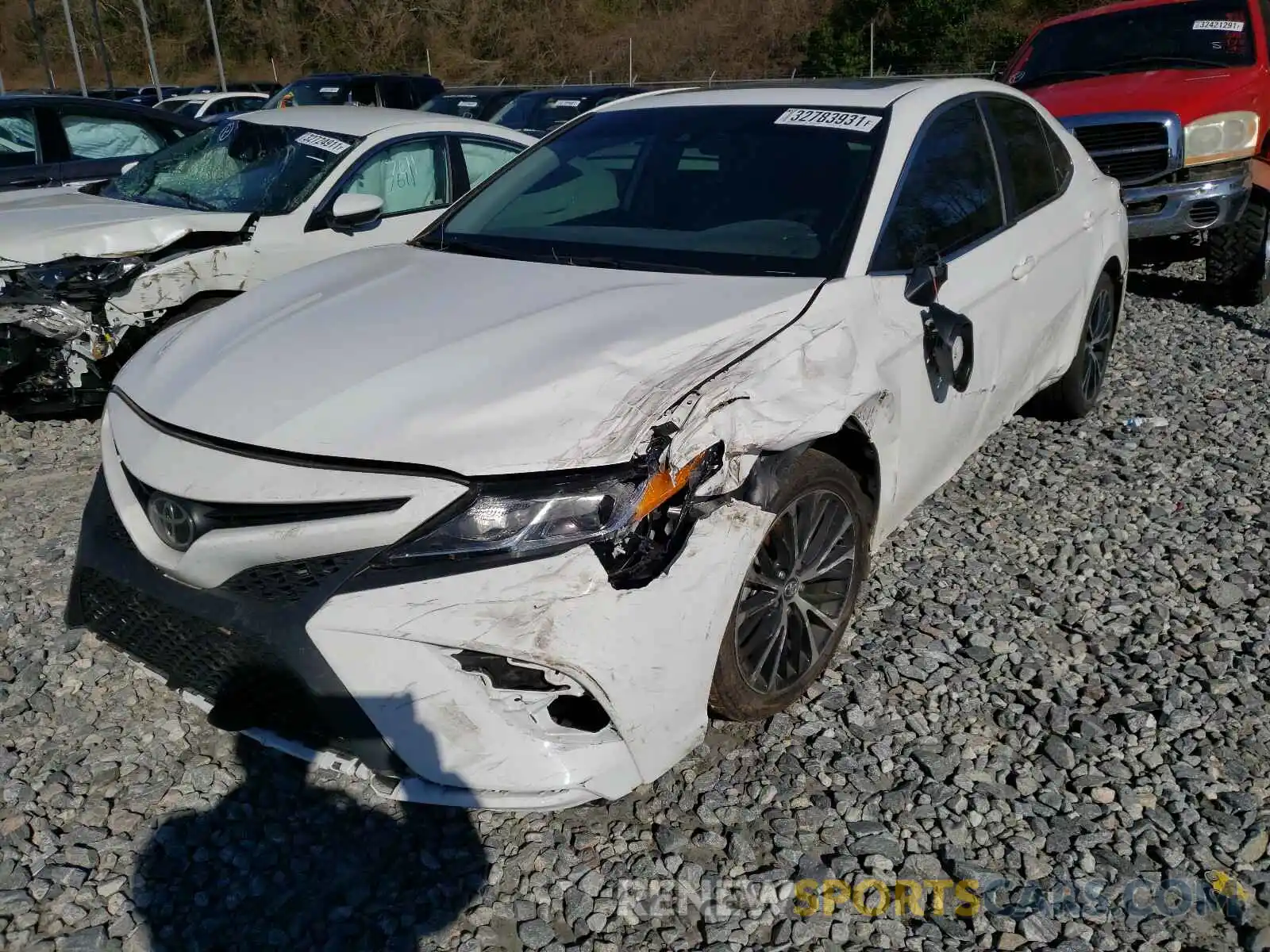 2 Photograph of a damaged car 4T1B11HK7KU825820 TOYOTA CAMRY 2019