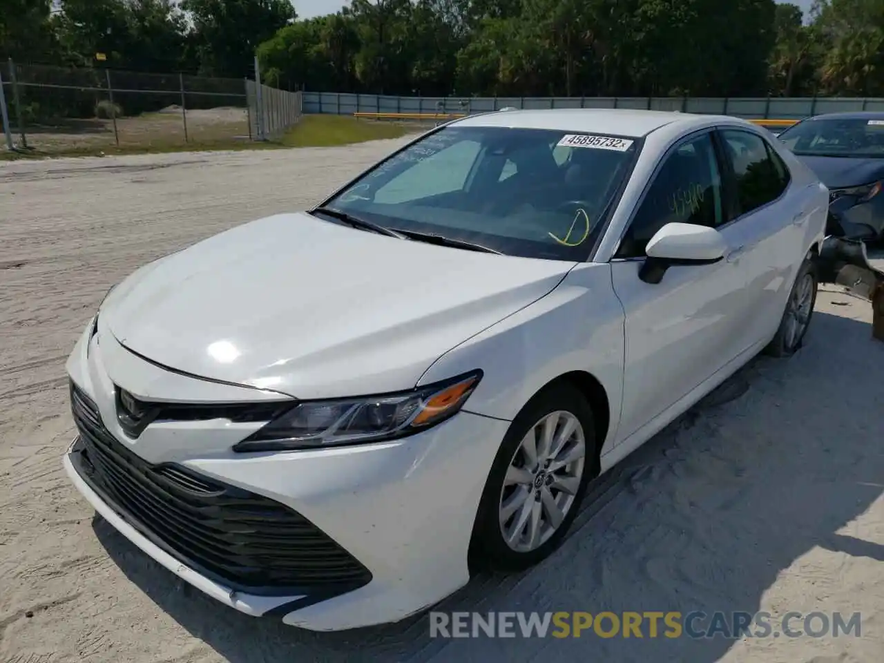 2 Photograph of a damaged car 4T1B11HK7KU830323 TOYOTA CAMRY 2019