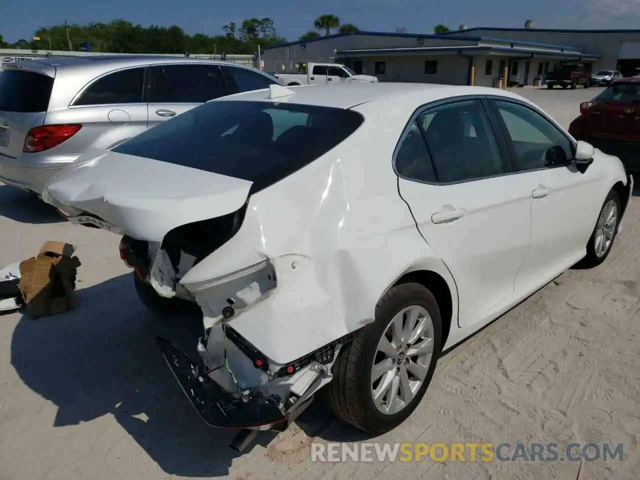 4 Photograph of a damaged car 4T1B11HK7KU830323 TOYOTA CAMRY 2019