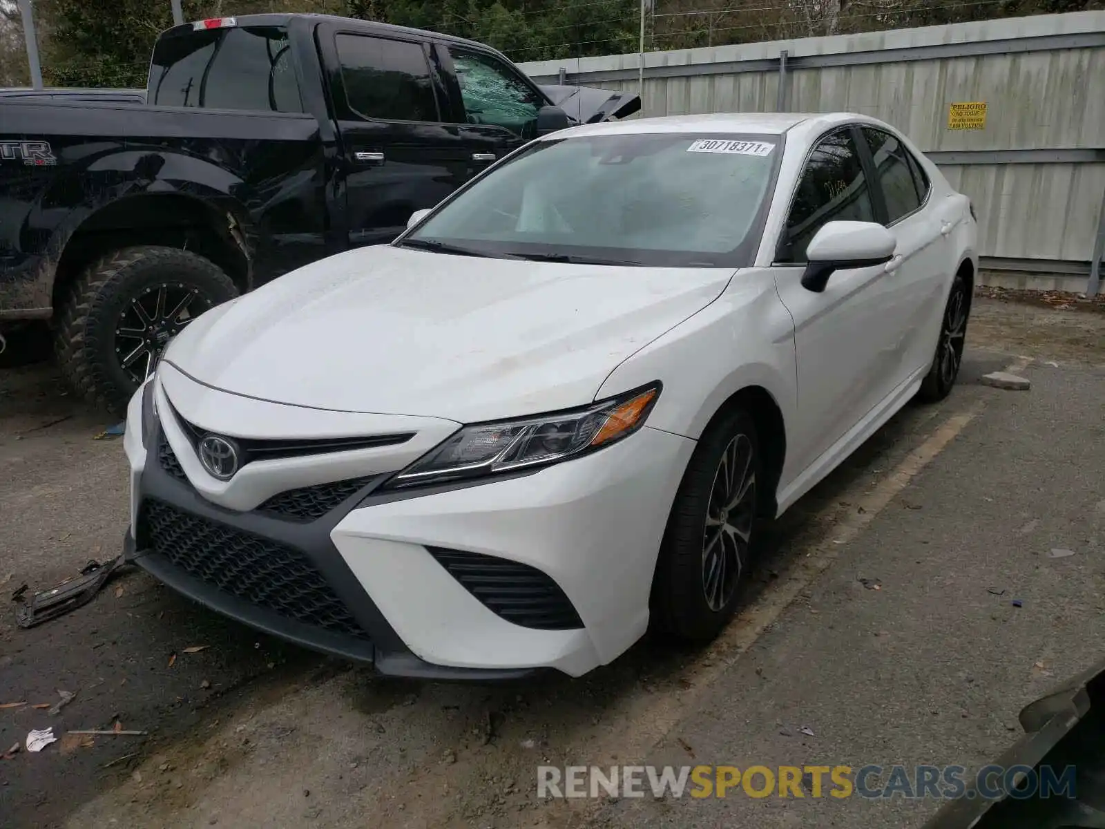 2 Photograph of a damaged car 4T1B11HK7KU834808 TOYOTA CAMRY 2019