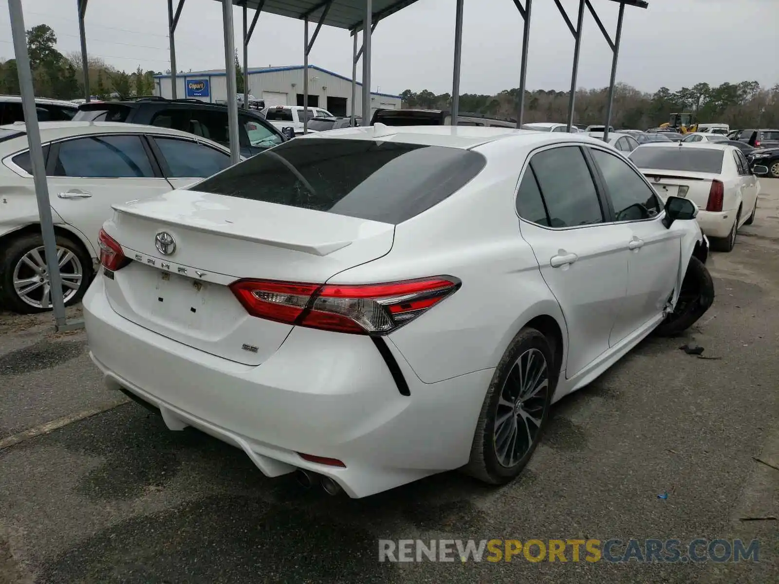 4 Photograph of a damaged car 4T1B11HK7KU834808 TOYOTA CAMRY 2019