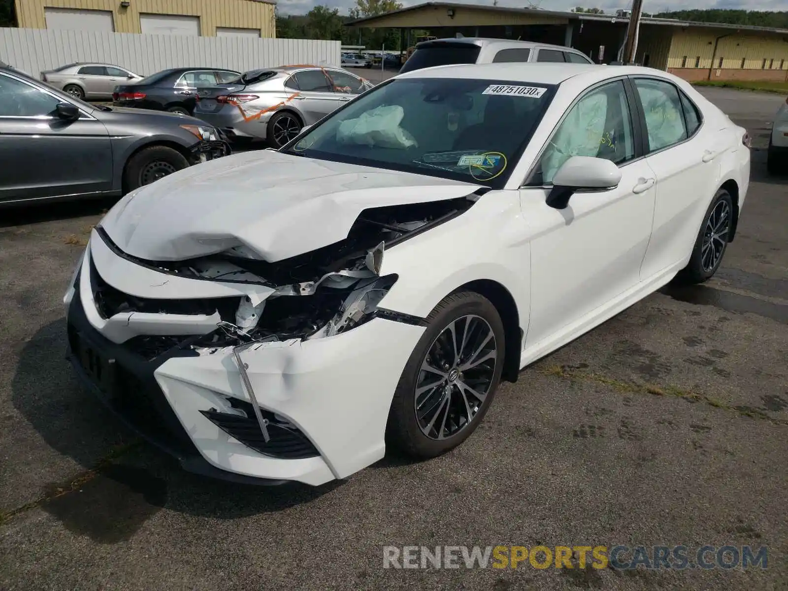 2 Photograph of a damaged car 4T1B11HK7KU835375 TOYOTA CAMRY 2019