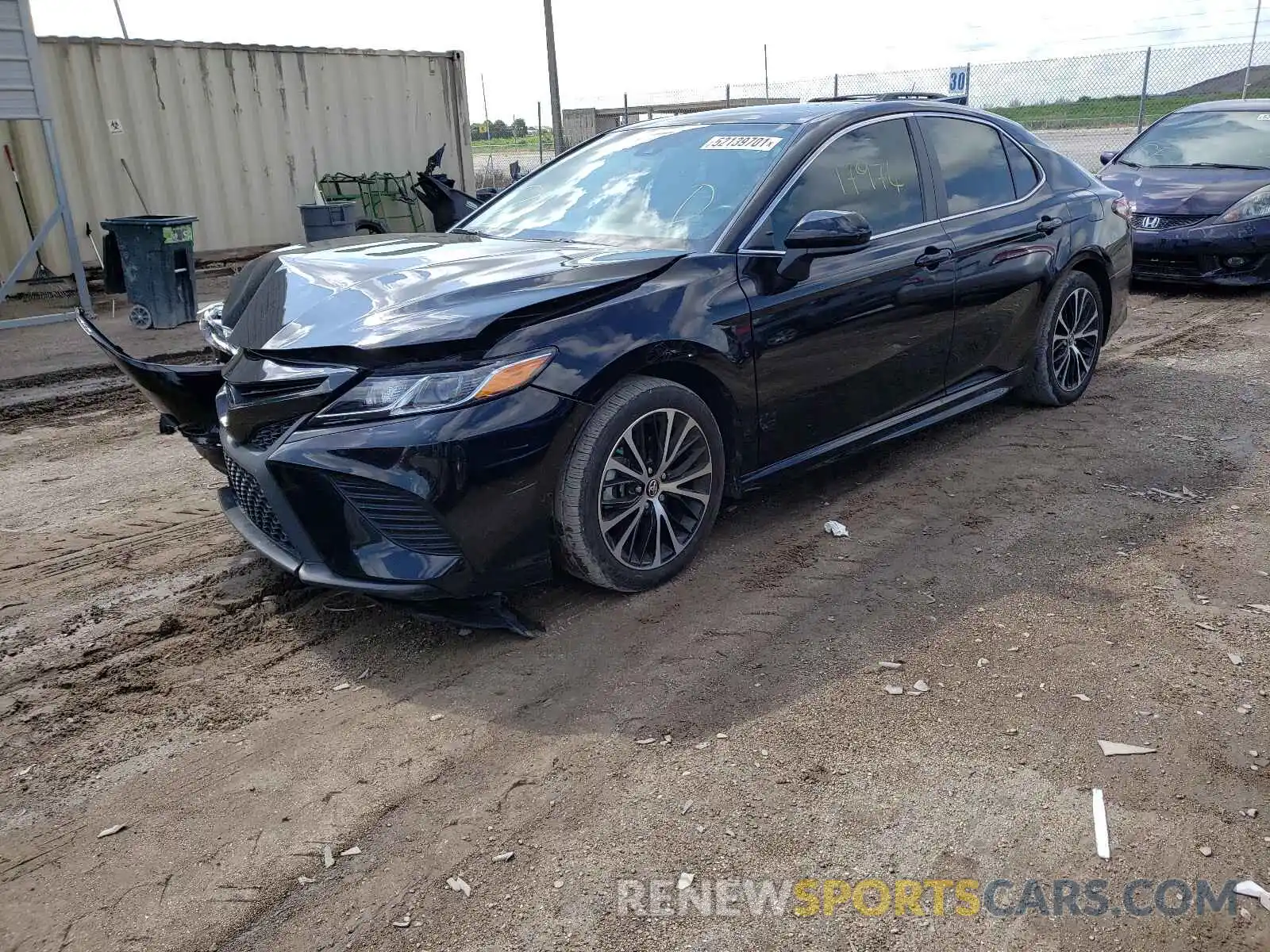 2 Photograph of a damaged car 4T1B11HK7KU840379 TOYOTA CAMRY 2019