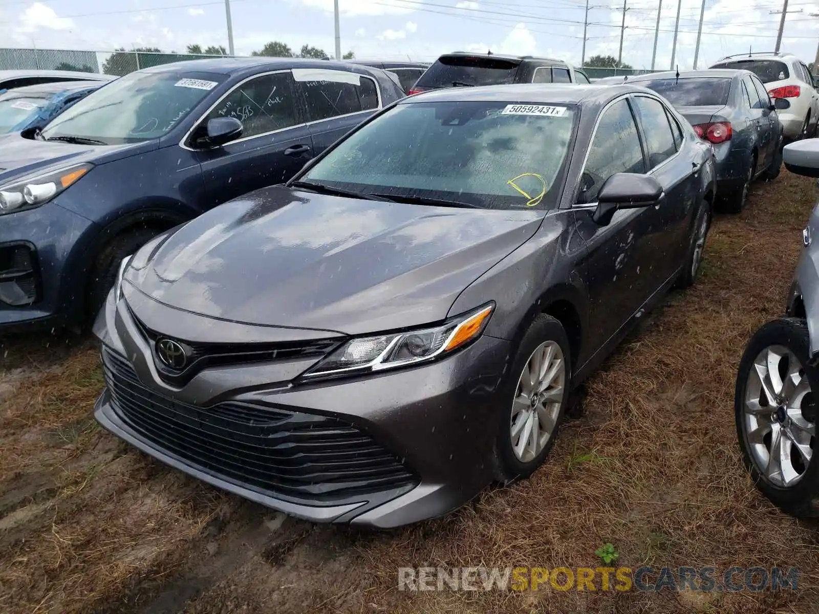 2 Photograph of a damaged car 4T1B11HK7KU843802 TOYOTA CAMRY 2019